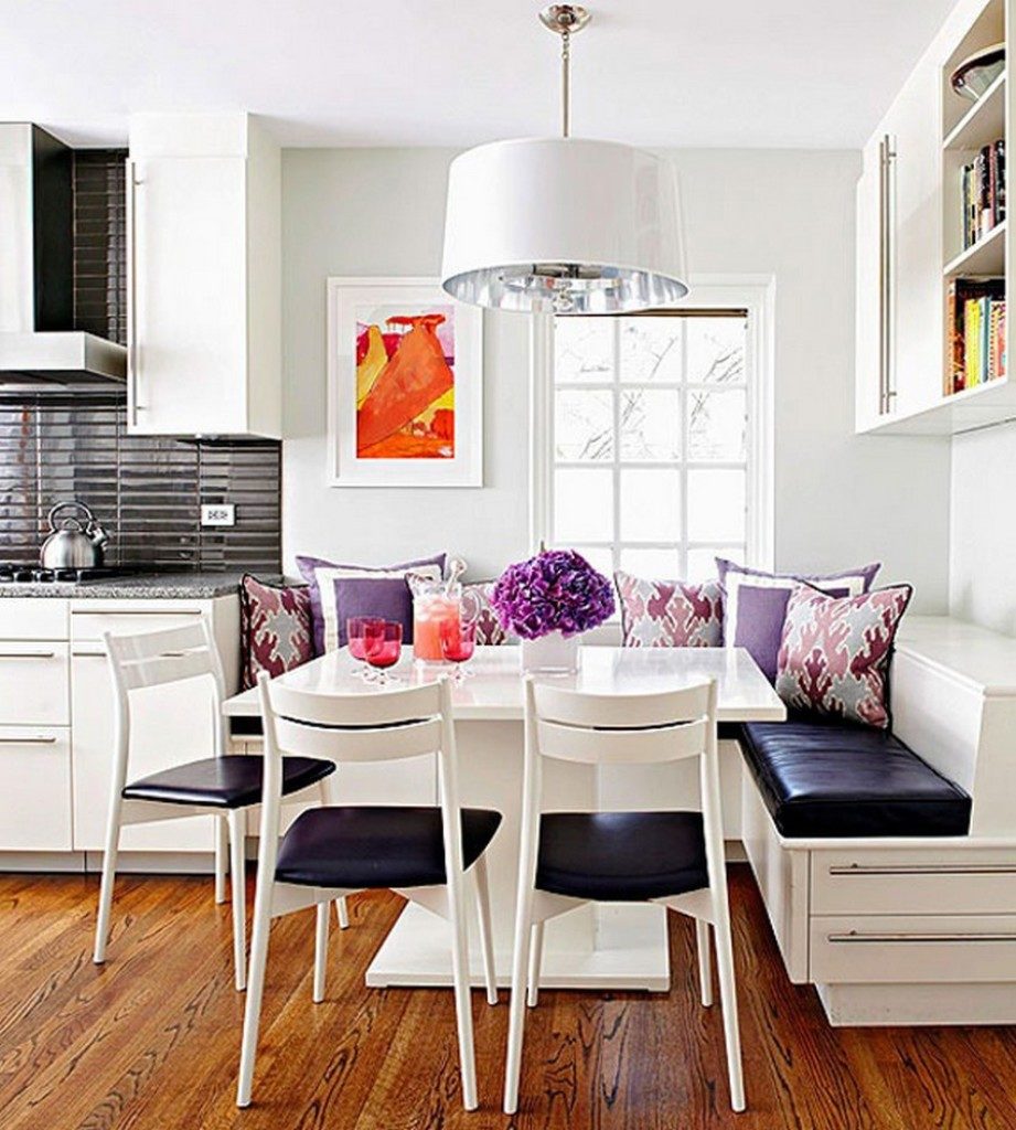 White chairs with black seats in the kitchenette