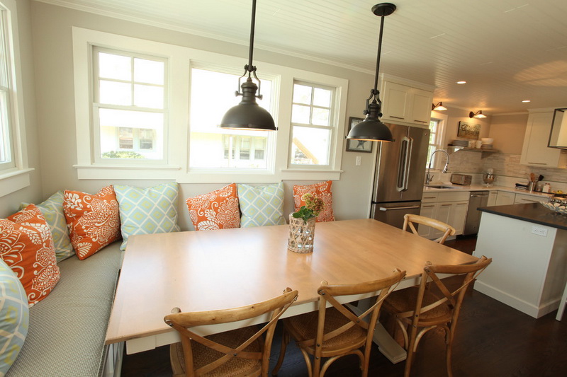 Large dining table near the kitchen sofa