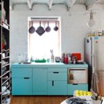 Kitchen interior with open cabinets.