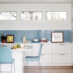 Narrow windows under the kitchen ceiling