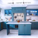 Bright parquet in the kitchen with a blue set