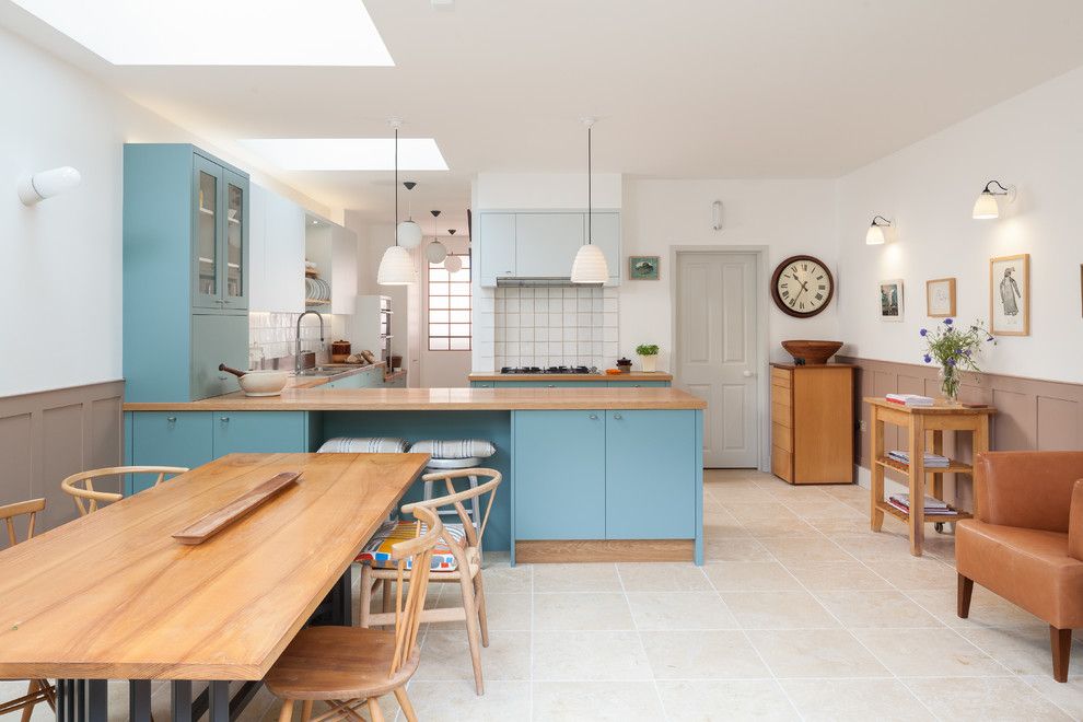 Spacious kitchen interior in blue and white