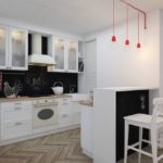 Design moderne d'une petite cuisine blanche et noire