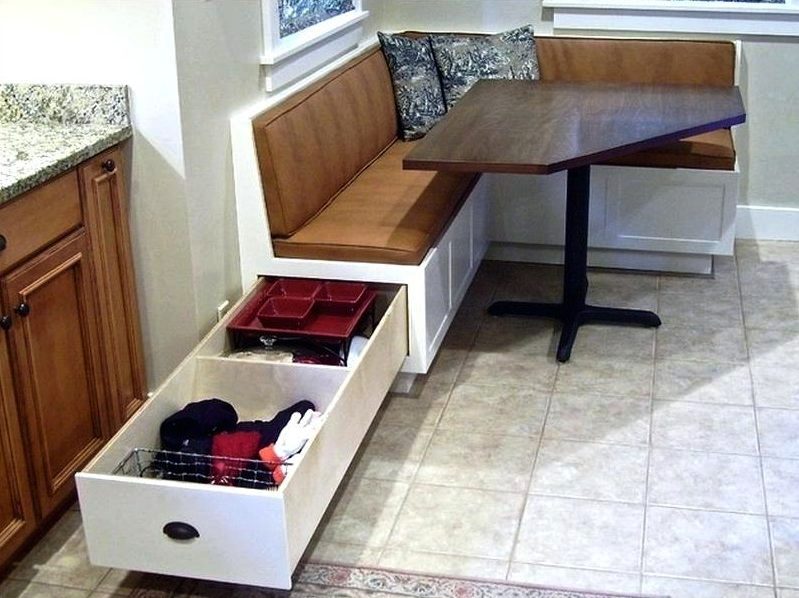 A long drawer at the end of the kitchen sofa