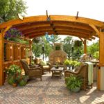 Wicker furniture and wooden pergola