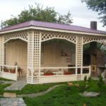 Garden arbor with blank wall