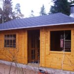 Summer house of boards on a summer cottage