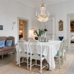 Glass chandelier over the dining table