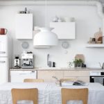 Line kitchen with white fridge