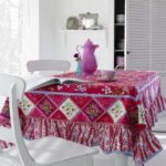 Pink jug on the kitchen table in a private house