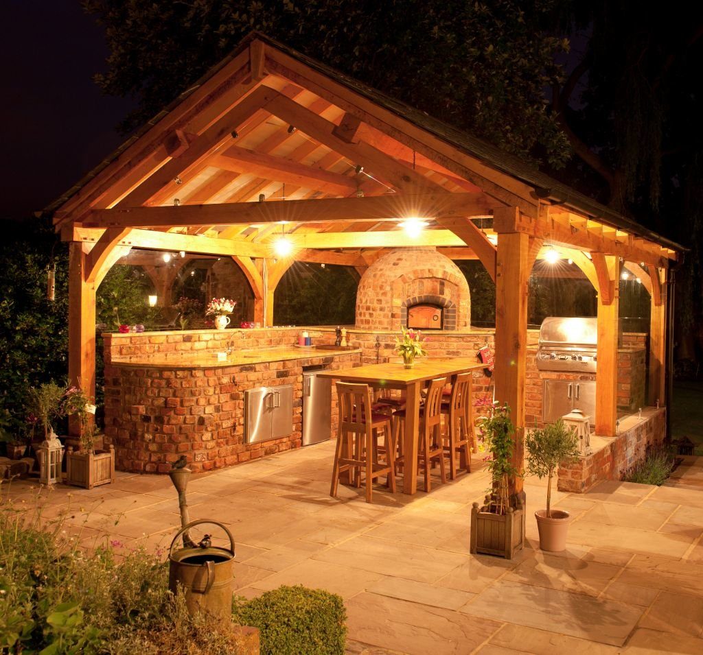 Bright illumination of summer kitchen at night