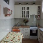 Tablecloth with flowers on the kitchen table