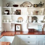 Open shelves with kitchen utensils