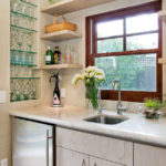 Small kitchen with a sink by the window