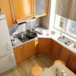 small kitchen with sink in place of window sill