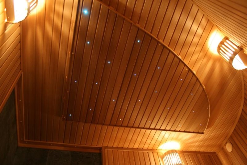 Wooden slats on the ceiling of the toilet in a private house