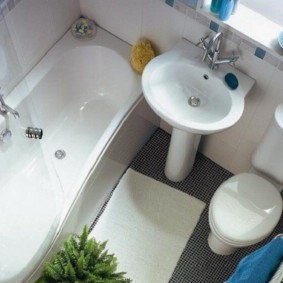 Compact plumbing in a small bathroom