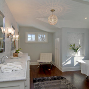 Carpet on the wooden floor in the bathroom