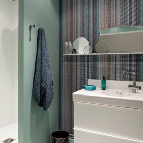 Narrow shelf above the bathroom sink