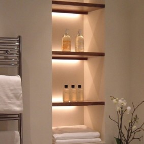 Illumination of built-in shelves in the bathroom