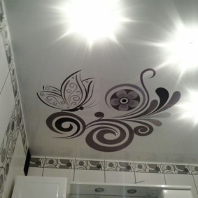 Toilet ceiling with patterns on the surface