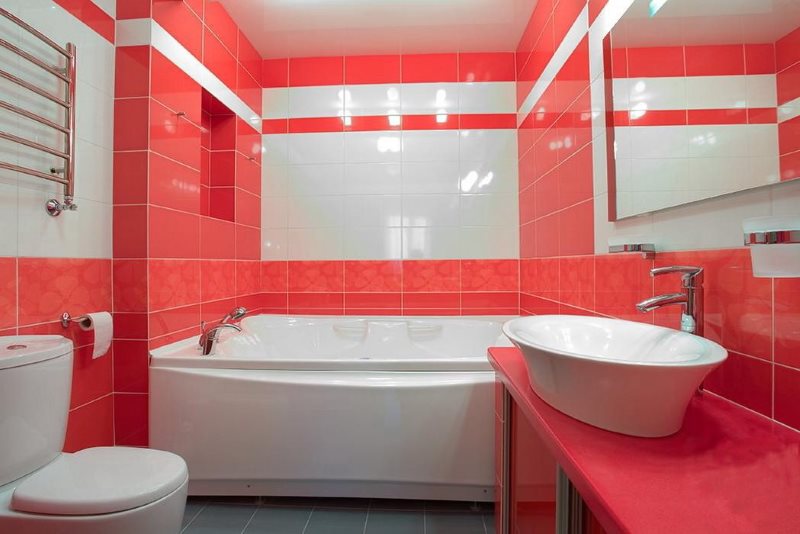 Red color in the interior of the bathroom