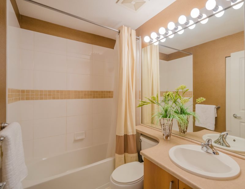 Light bulbs above the mirror in the bathroom after repair