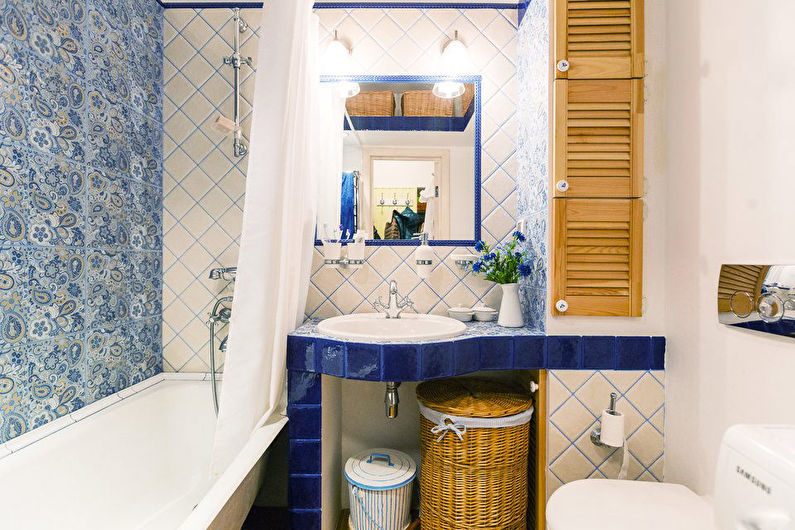 Wooden doors on lockers in a small bathroom