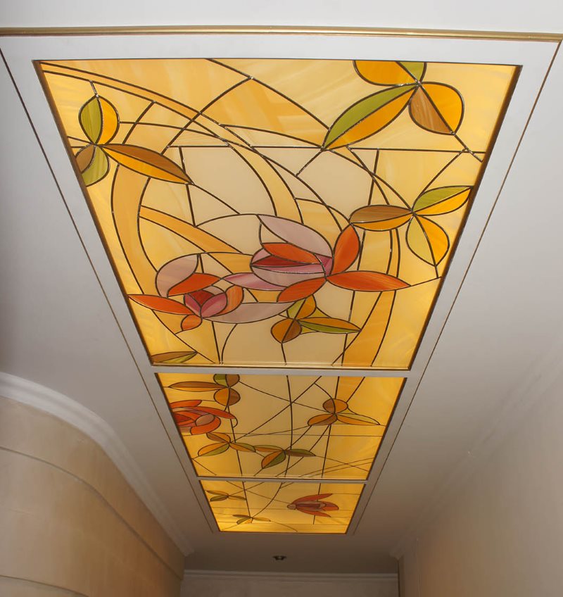 Stained glass ceiling in the interior of the toilet