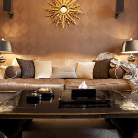 decorative pillows on a leather sofa