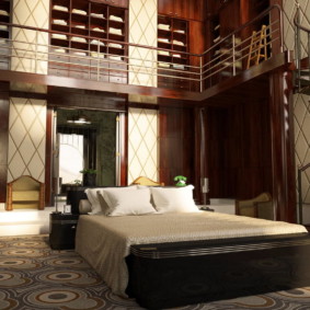 Bedroom with staircase in a country house.