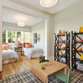 children's bedroom with a bed by the window photo