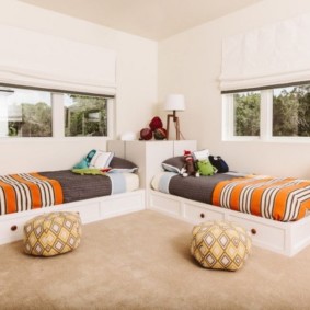 bedroom with beds by the window