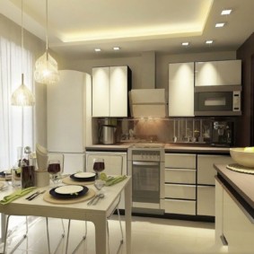 Cucina design con tende bianche.