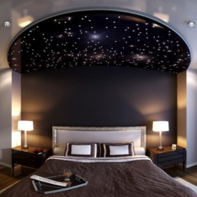 Decor of the bedroom with the imitation of the starry sky