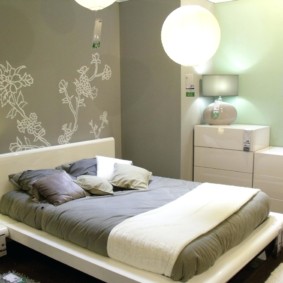 Gray wallpaper in the bedroom interior