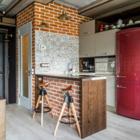 Bar counter in the loft style kitchen