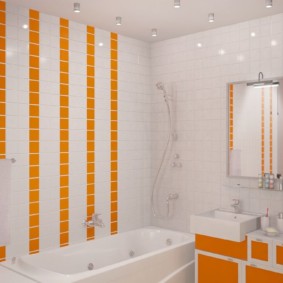 Accents orange à l'intérieur d'une baignoire blanche