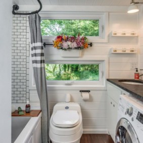 White toilet on the laminate floor