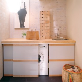 Tkmba with sliding doors for a washing machine