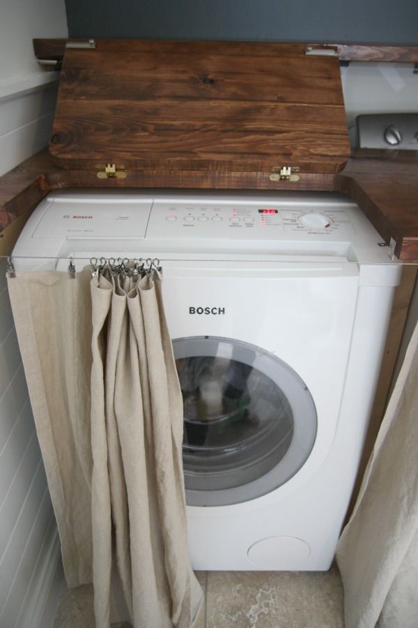 The machine behind the curtain in the bathroom of a private house