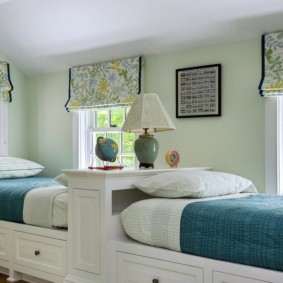 teenage bedroom with a window bed