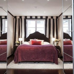 chic bedroom with a bed by the window