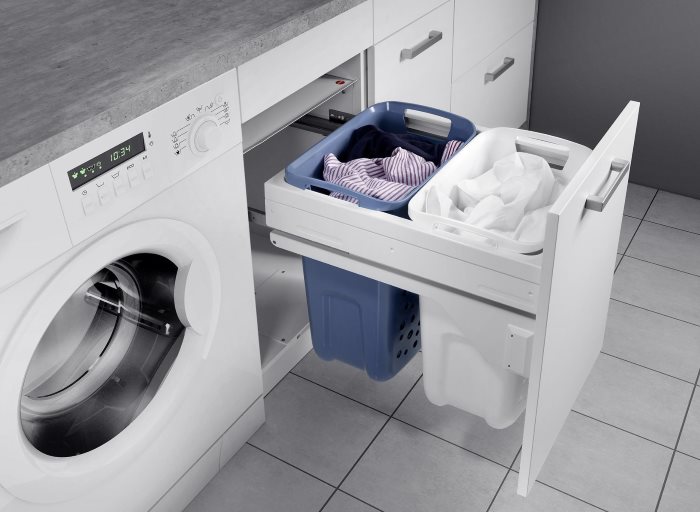 Drawer in the cabinet for a washing machine