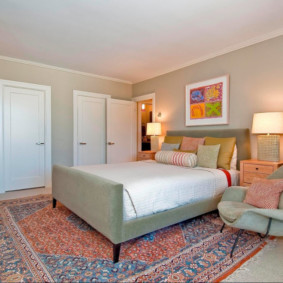 Interior of a bedroom with white doors