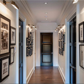 Narrow apartment corridor with dark doors