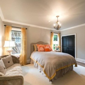 Chandelier above the double bed