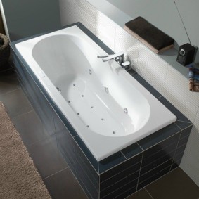 White bathtub with hydromassage