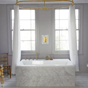 Bright bathroom with white curtains