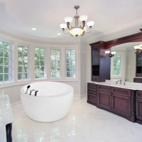 Wooden furniture in a large bathroom